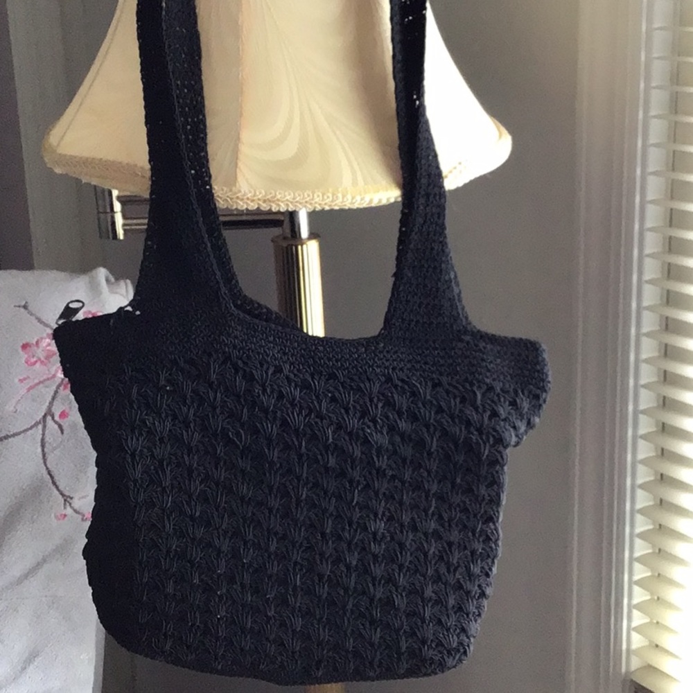 Black crochet handbag, zippered tip, lined, 9 x 11 inches